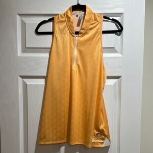 Orange Sleeveless Golf Top annbriar golf club logo
